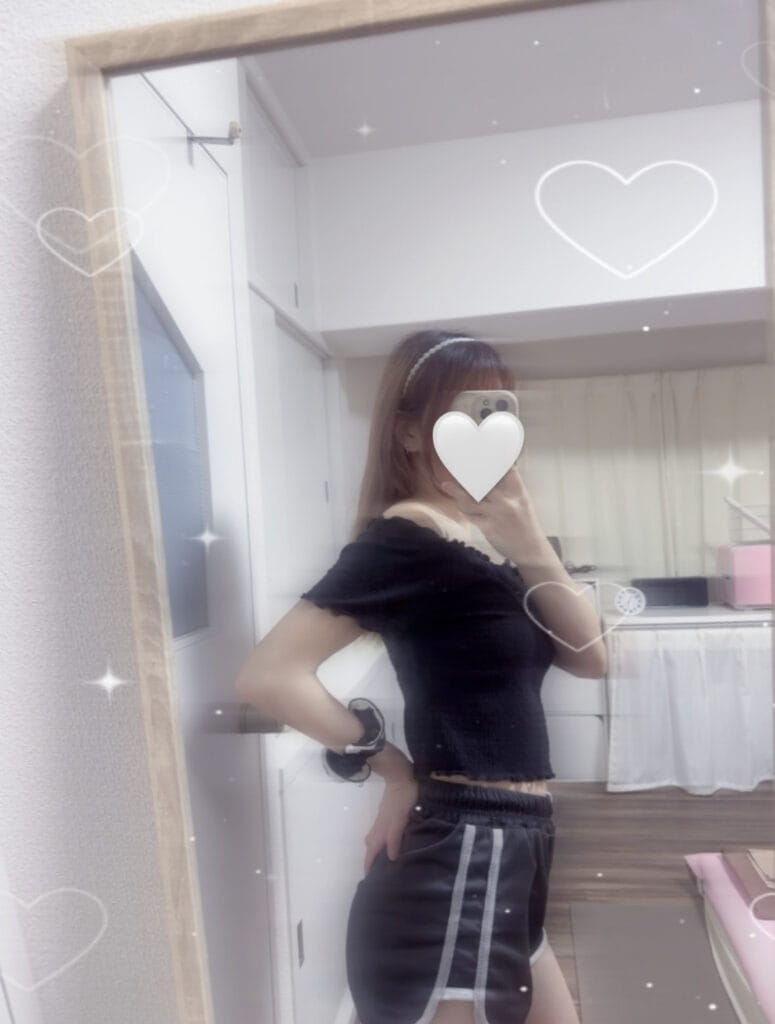 a woman taking a selfie in a mirror