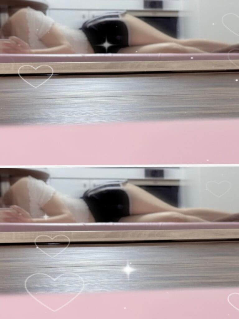a woman lying on a bed
